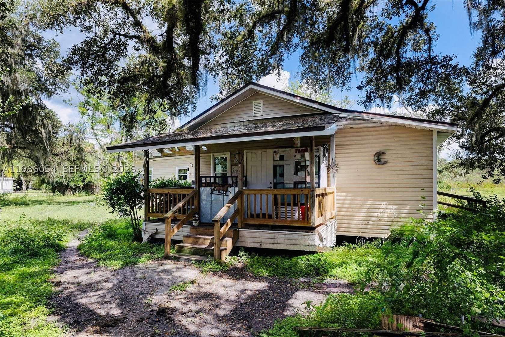 6 Acres of Land with Home for Sale in Moore Haven, Florida
