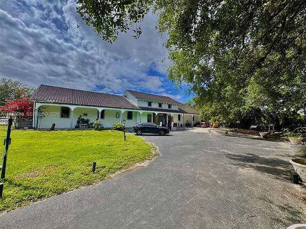 2.13 Acres of Land with Home for Sale in Southwest Ranches, Florida