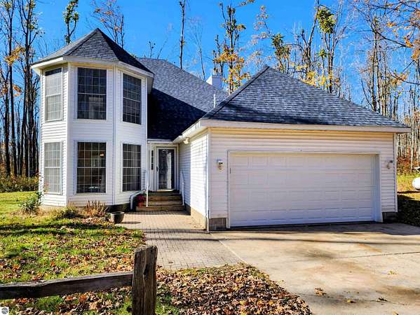 10 Acres of Land with Home for Sale in Elmira, Michigan