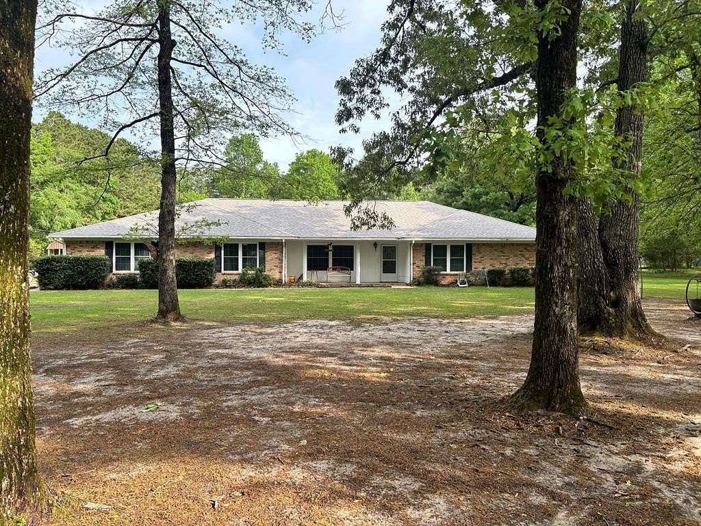 1.69 Acres of Land with Home for Sale in Diboll, Texas