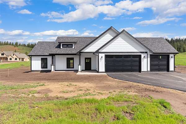 1.57 Acres of Land with Home for Sale in Huson, Montana