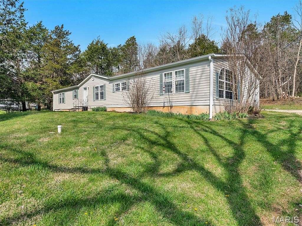 3.74 Acres of Land with Home for Sale in Dittmer, Missouri