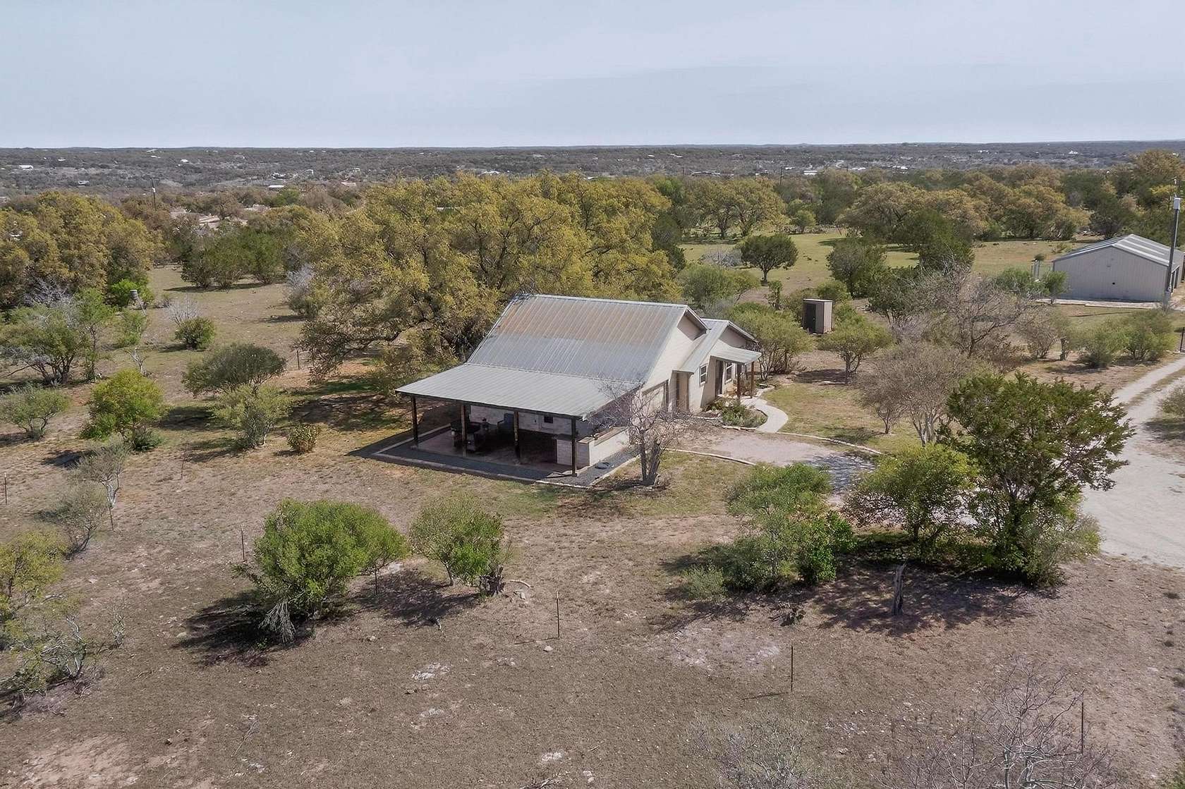 29.8 Acres of Agricultural Land with Home for Sale in Johnson City, Texas