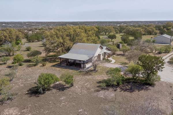 29.8 Acres of Agricultural Land with Home for Sale in Johnson City, Texas