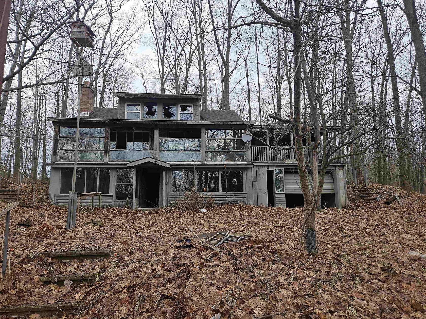 20 Acres of Recreational Land with Home for Sale in Harrison, Michigan