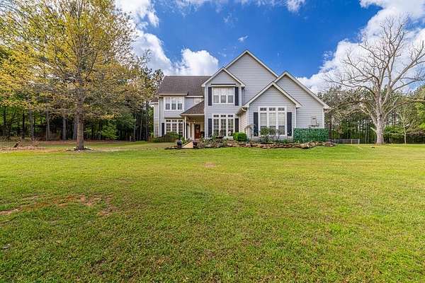 28.5 Acres of Recreational Land with Home for Sale in Douglass, Texas