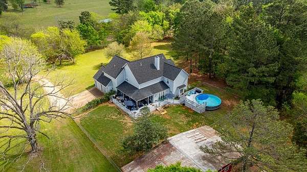 28.5 Acres of Recreational Land with Home for Sale in Douglass, Texas