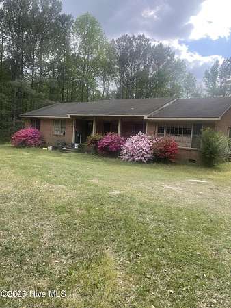 27.6 Acres of Land with Home for Sale in Rose Hill, North Carolina