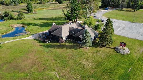 4 Acres of Improved Commercial Land for Sale in Brutus, Michigan