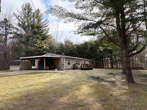 1.8 Acres of Land with Home for Sale in Farwell, Michigan