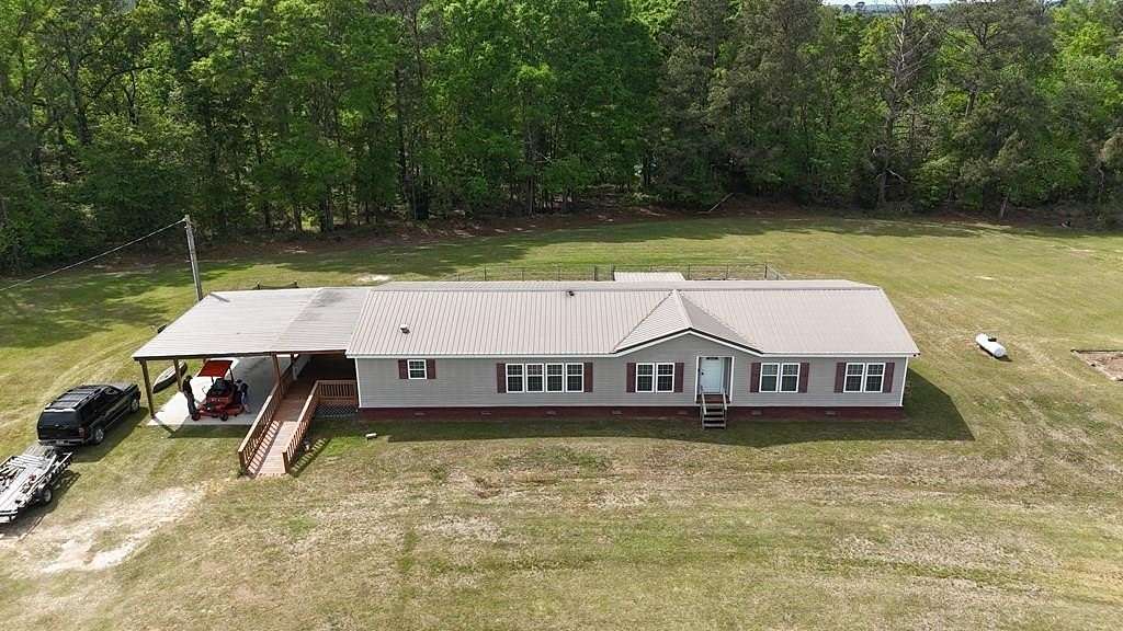 10.5 Acres of Land with Home for Sale in Brundidge, Alabama