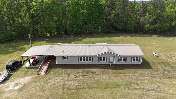 10.5 Acres of Land with Home for Sale in Brundidge, Alabama