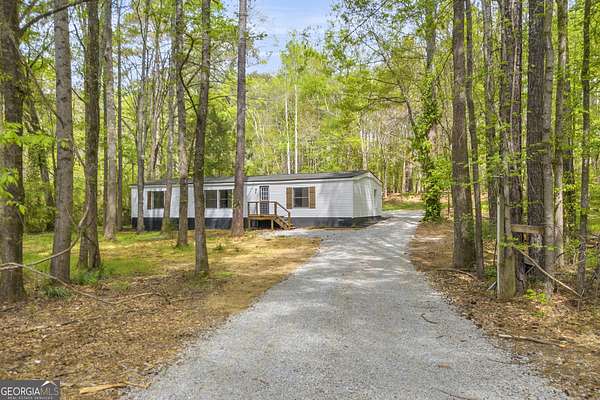 2.25 Acres of Land with Home for Sale in Arnoldsville, Georgia