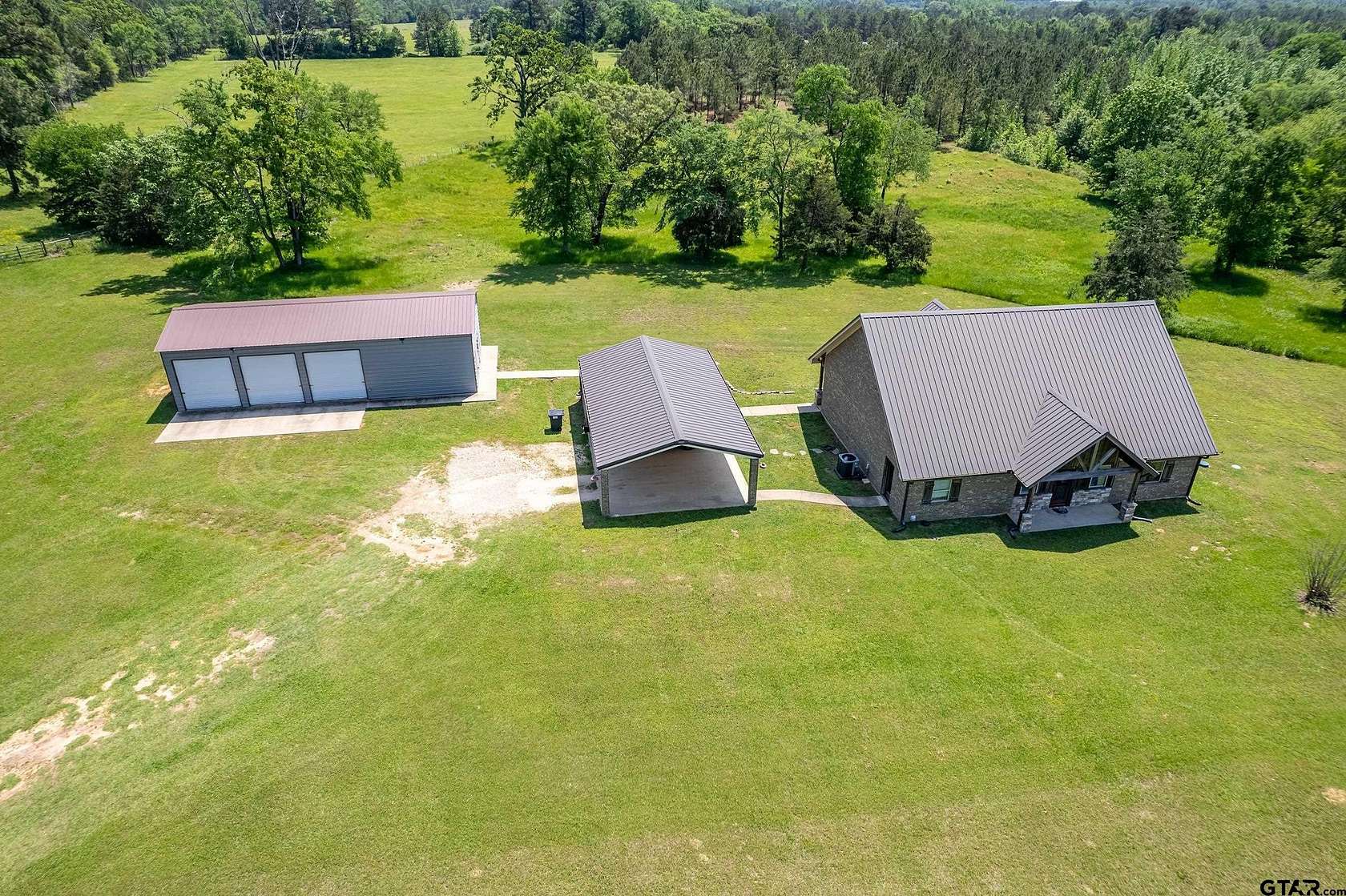 10.3 Acres of Land with Home for Sale in Henderson, Texas