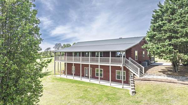 9.7 Acres of Land with Home for Sale in Dayton, Tennessee