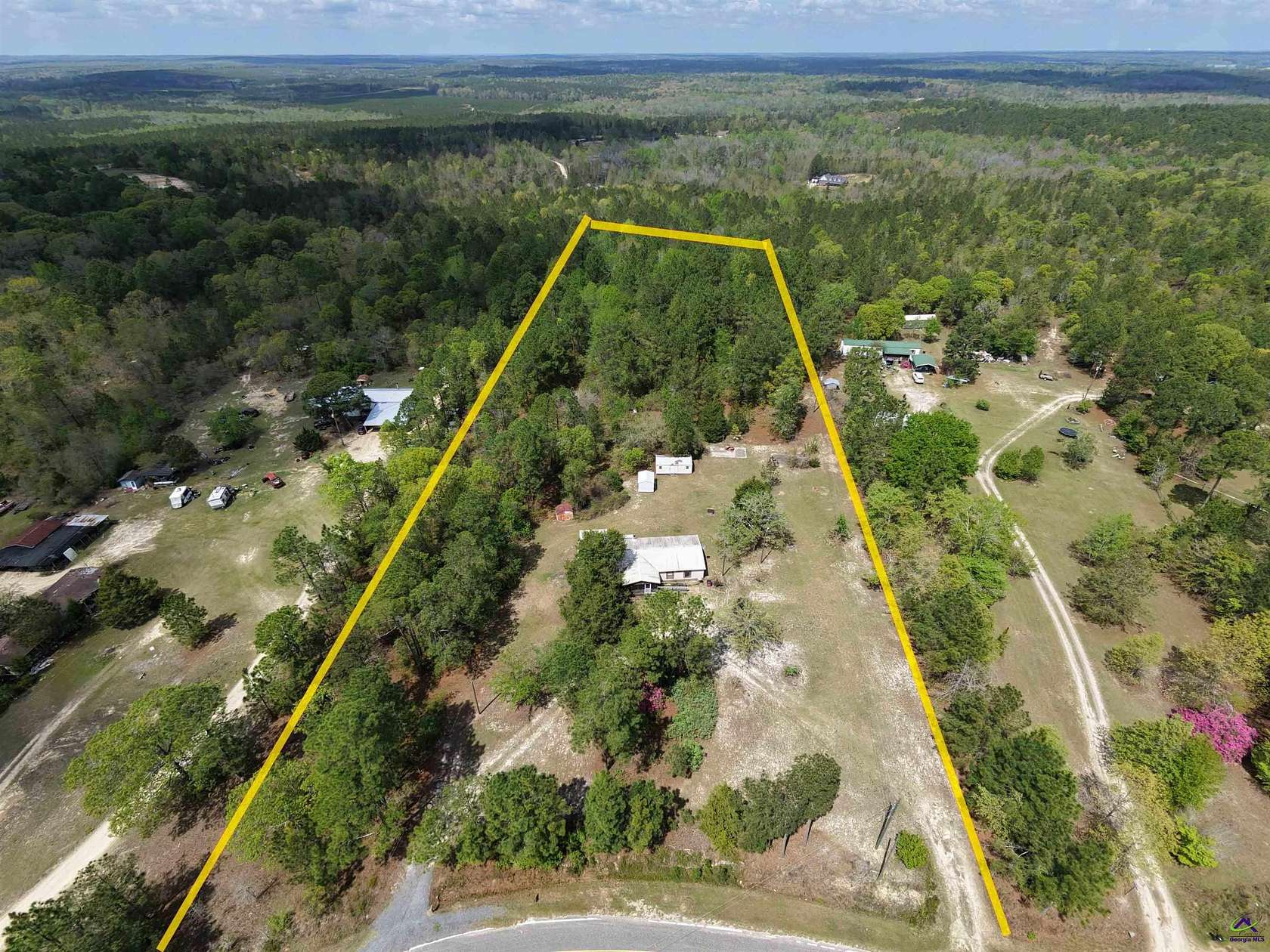 5.54 Acres of Land with Home for Sale in Byron, Georgia