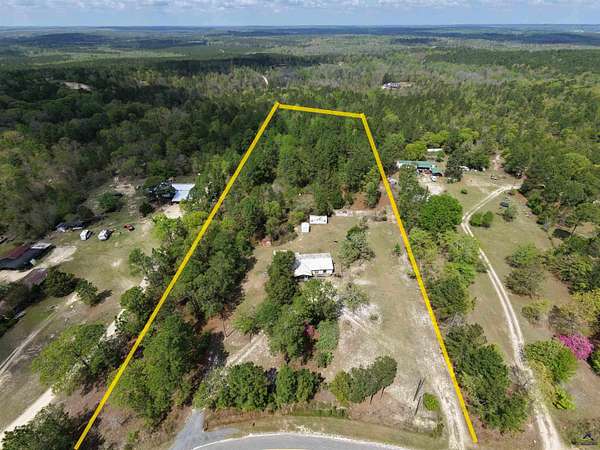 5.54 Acres of Land with Home for Sale in Byron, Georgia
