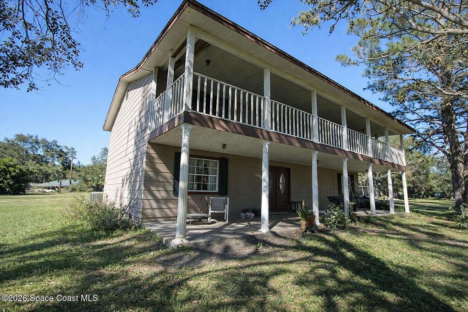 2.8 Acres of Land with Home for Sale in Mims, Florida