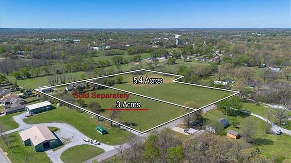 5.4 Acres of Land for Sale in Gravette, Arkansas