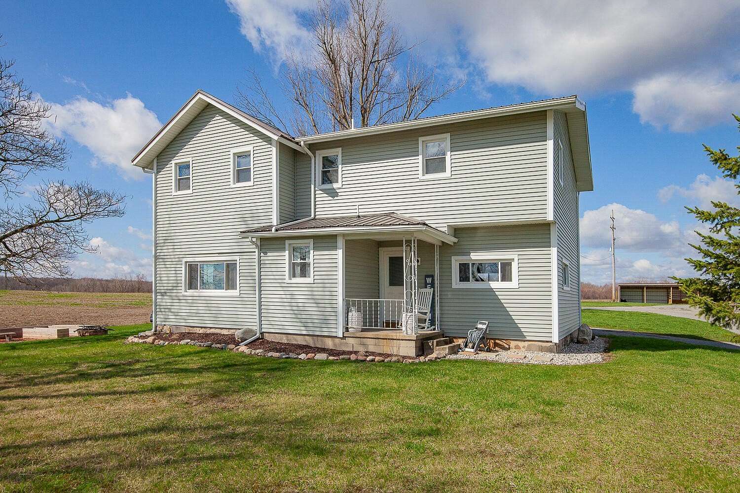 2 Acres of Land with Home for Sale in Clayton, Michigan