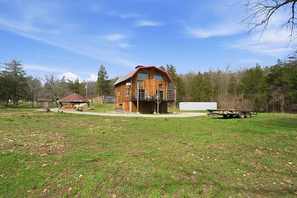 40 Acres of Land with Home for Sale in Walnut Shade, Missouri