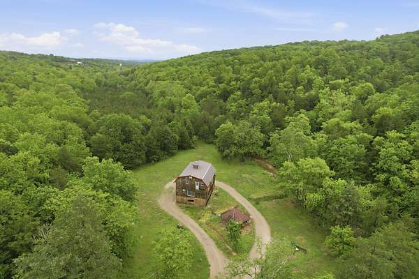 40 Acres of Land with Home for Sale in Walnut Shade, Missouri