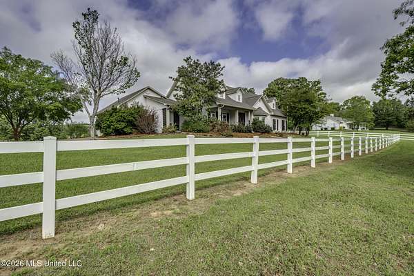 5 Acres of Land with Home for Sale in Madison, Mississippi