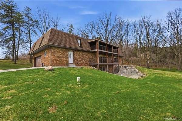 7.38 Acres of Land with Home for Sale in Hadley Township, Michigan