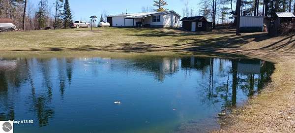 3 Acres of Land with Home for Sale in Prescott, Michigan