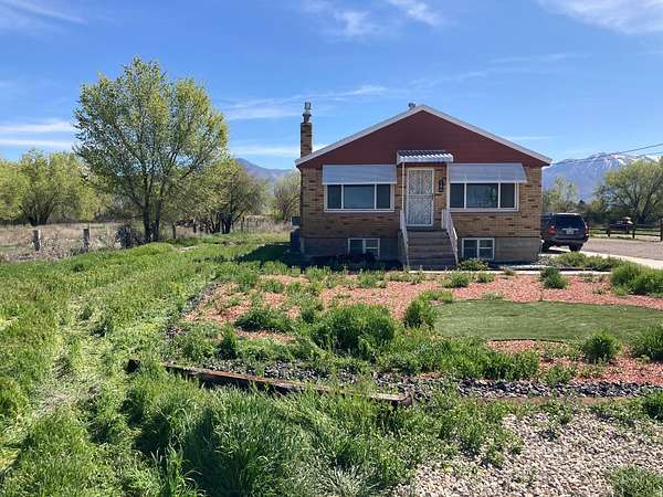 1.73 Acres of Land with Home for Sale in Marriott-Slaterville, Utah