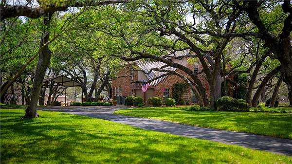 7.36 Acres of Land with Home for Sale in Floresville, Texas