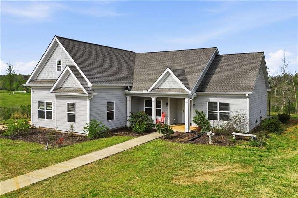 10 Acres of Land with Home for Sale in Ball Ground, Georgia