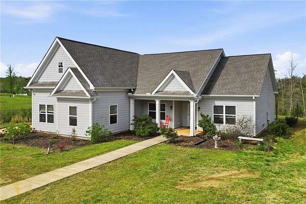 10 Acres of Land with Home for Sale in Ball Ground, Georgia