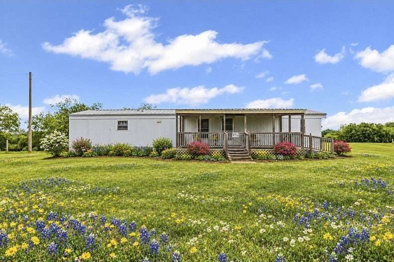 22 Acres of Land with Home for Sale in Covington, Texas