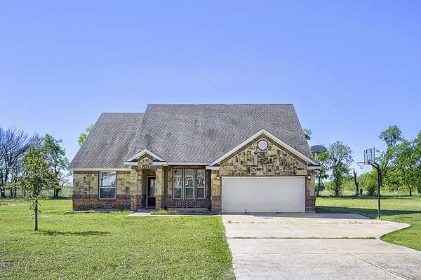 1.5 Acres of Land with Home for Sale in Howe, Texas