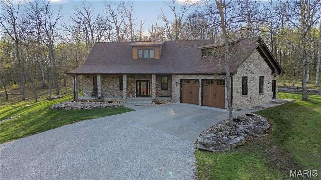23.4 Acres of Land with Home for Sale in Hawk Point, Missouri
