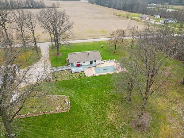 9.14 Acres of Land with Home for Auction in Atwater, Ohio