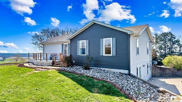 14 Acres of Land with Home for Sale in Campbellsville, Kentucky