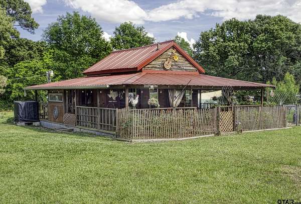 0.96 Acres of Land with Home for Sale in Chandler, Texas