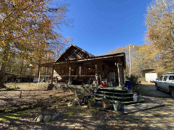 3.34 Acres of Land with Home for Sale in Huttig, Arkansas