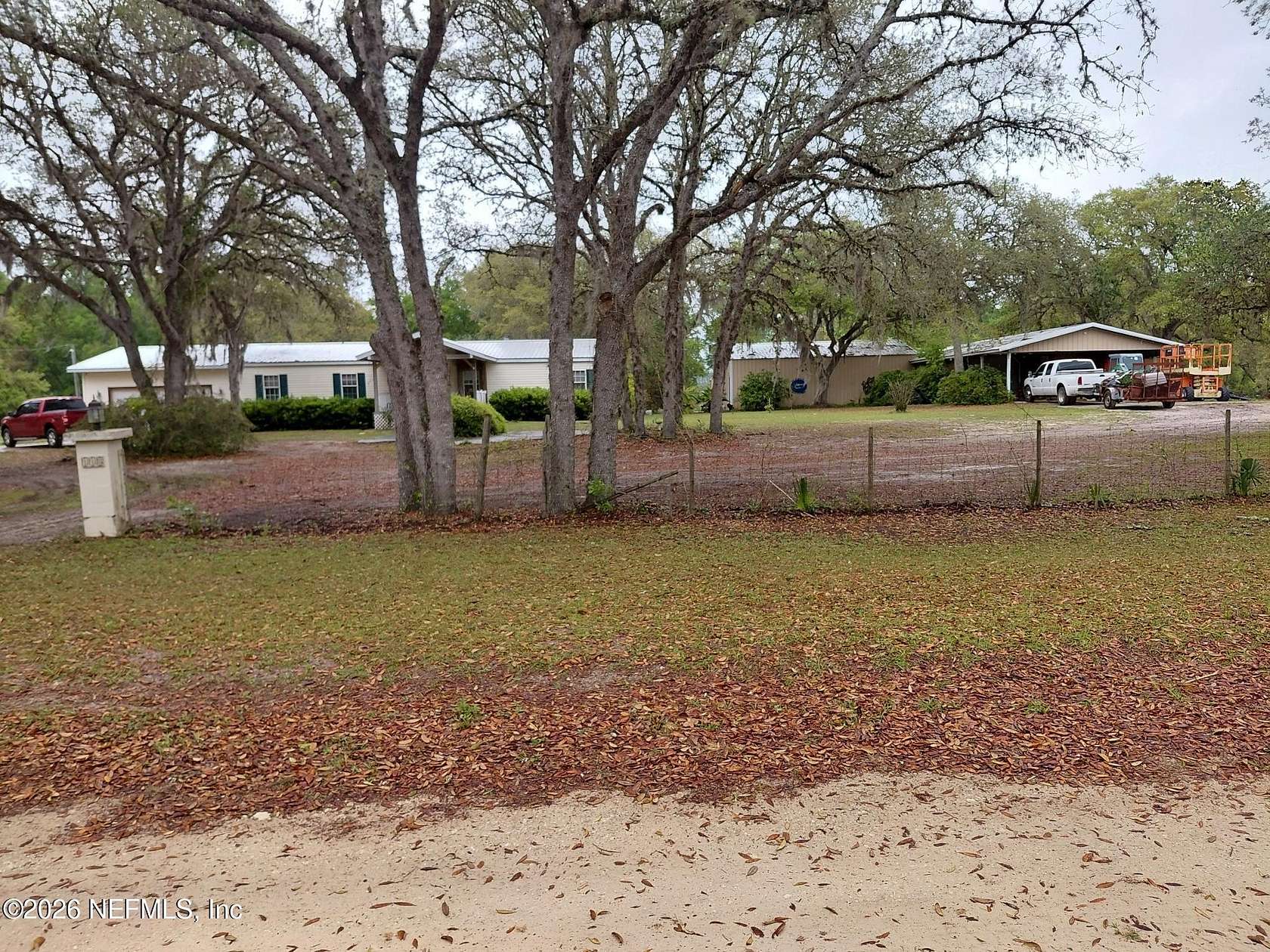 2 Acres of Land with Home for Sale in Pomona Park, Florida