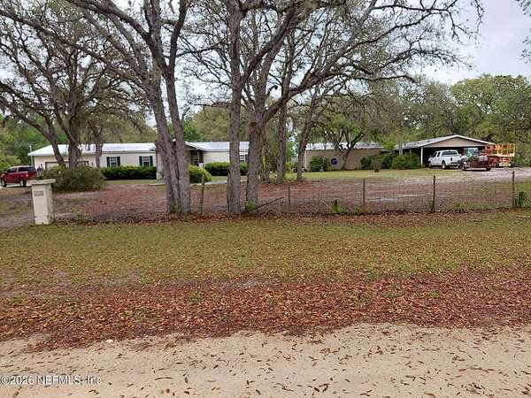 2 Acres of Land with Home for Sale in Pomona Park, Florida
