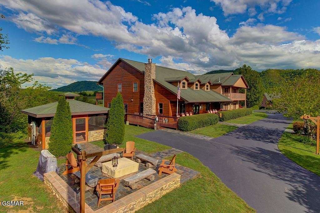 10.4 Acres of Land with Home for Sale in Sevierville, Tennessee