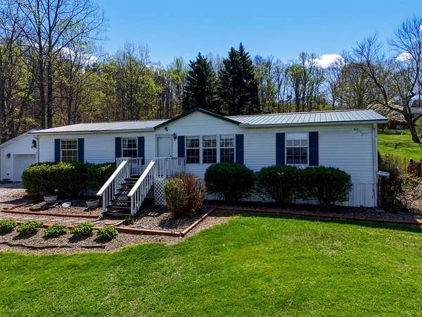 11.9 Acres of Land with Home for Sale in Hurricane, West Virginia