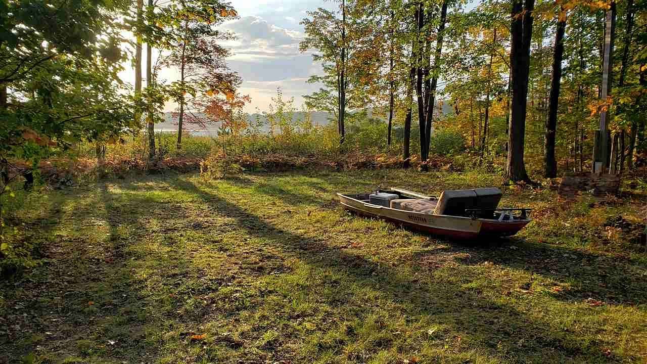 4.5 Acres of Improved Residential Land for Sale in Carp Lake, Michigan