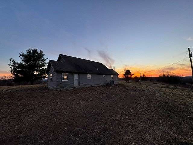 10 Acres of Land with Home for Sale in Alpena, Arkansas