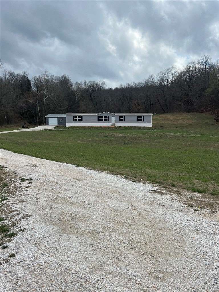 3.42 Acres of Land with Home for Sale in West Fork, Arkansas