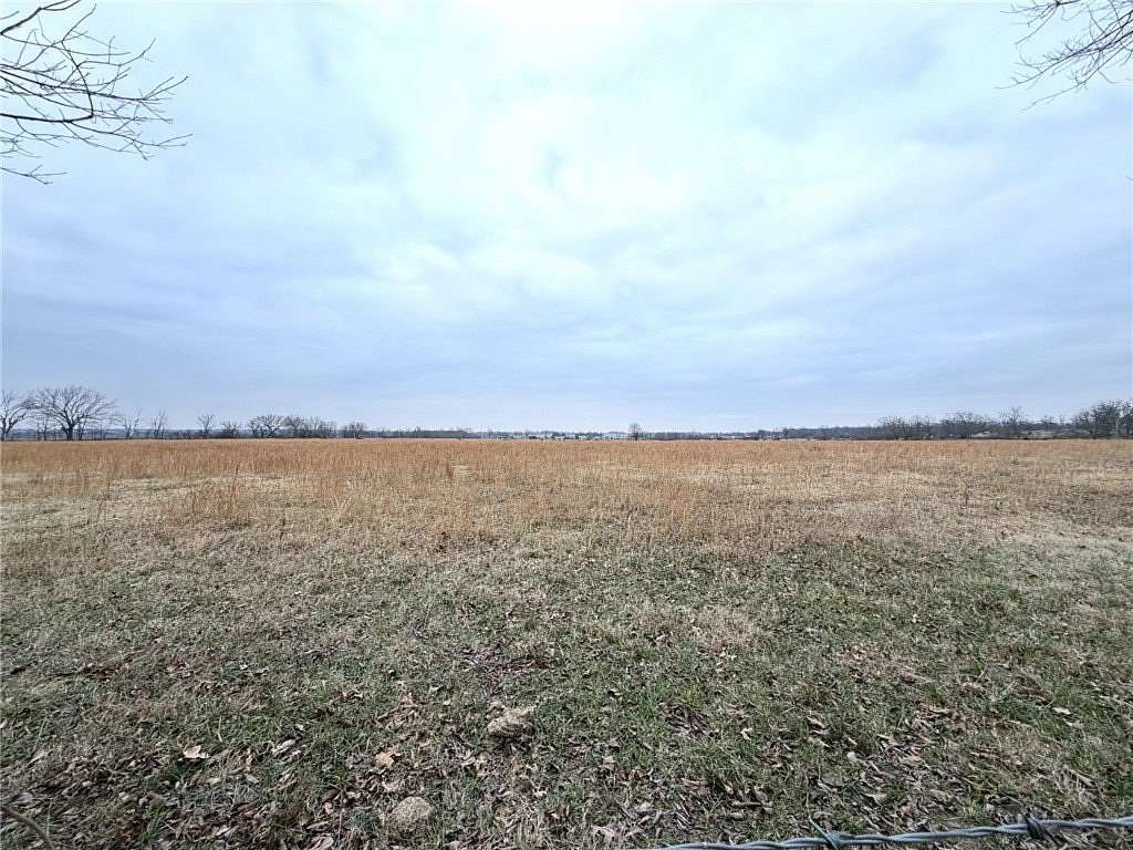 85 Acres of Agricultural Land for Sale in Gravette, Arkansas