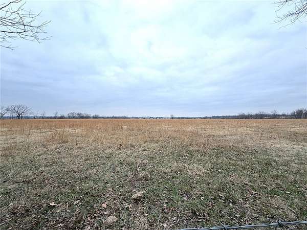 85 Acres of Agricultural Land for Sale in Gravette, Arkansas