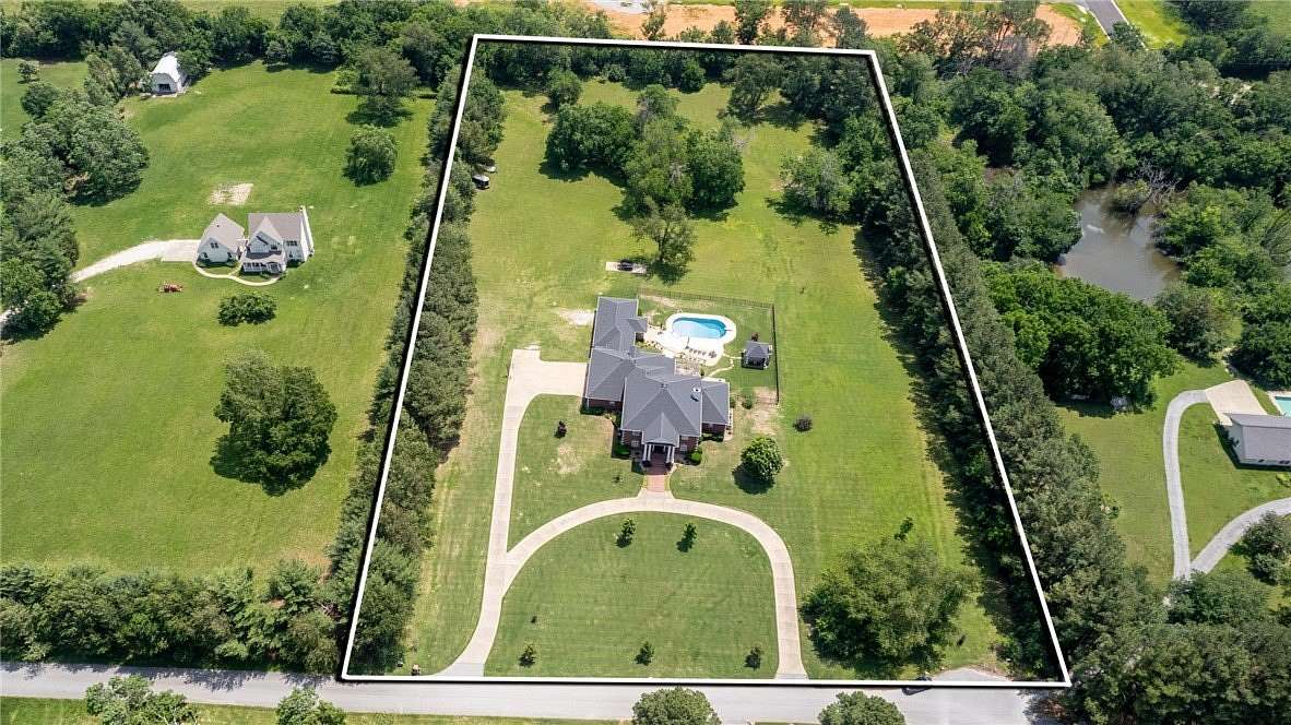 5 Acres of Land with Home for Sale in Rogers, Arkansas